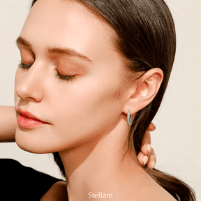 Sterling silver hoop earrings with heart-cut details and zirconia – symbolic, stylish and elegant design for everyday or gifting