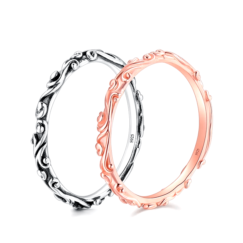Sterling silver floral ring set with engraved nature-inspired patterns – stackable duo in silver and rose tones for romantic everyday wear