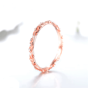 Sterling silver floral ring set with engraved nature-inspired patterns – stackable duo in silver and rose tones for romantic everyday wear