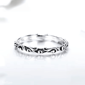 Sterling silver floral ring set with engraved nature-inspired patterns – stackable duo in silver and rose tones for romantic everyday wear