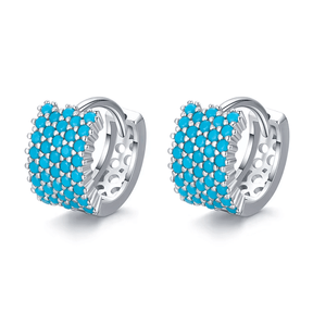 Sterling silver geometric stud earrings with textured turquoise design – bold and modern for elegant everyday looks