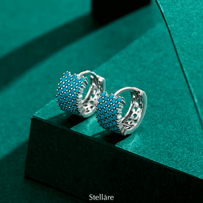 Sterling silver geometric stud earrings with textured turquoise design – bold and modern for elegant everyday looks