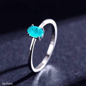 Sterling silver ring with bright oval-cut blue gemstone – minimalist and elegant band for everyday wear