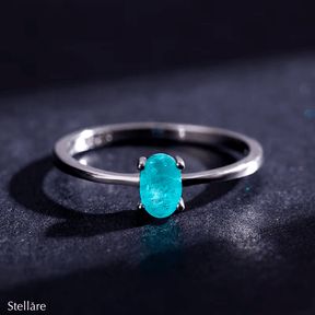 Sterling silver ring with bright oval-cut blue gemstone – minimalist and elegant band for everyday wear