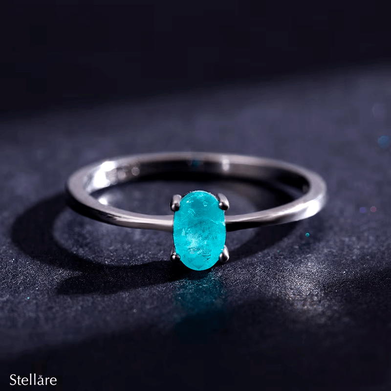 Sterling silver ring with bright oval-cut blue gemstone – minimalist and elegant band for everyday wear