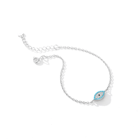 Sterling silver bracelet with blue evil eye charm – minimalist protection jewellery with spiritual meaning and elegance