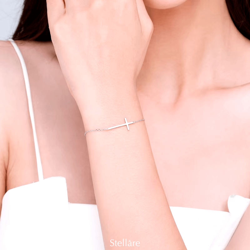 Sterling silver bracelet with horizontal cross charm – delicate and meaningful design representing faith and elegance