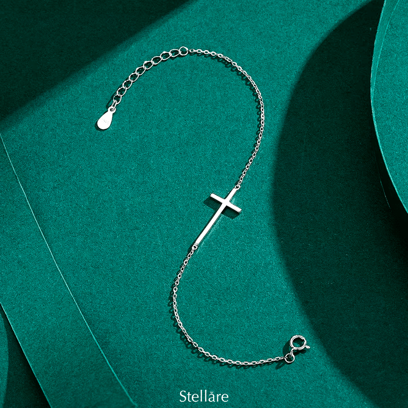 Sterling silver bracelet with horizontal cross charm – delicate and meaningful design representing faith and elegance