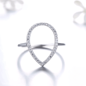 Sterling silver teardrop ring with pavé zirconia – modern open band design in silver or rose gold