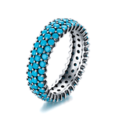 Sterling silver ring with vibrant turquoise stones – bold pavé band with boho-inspired style